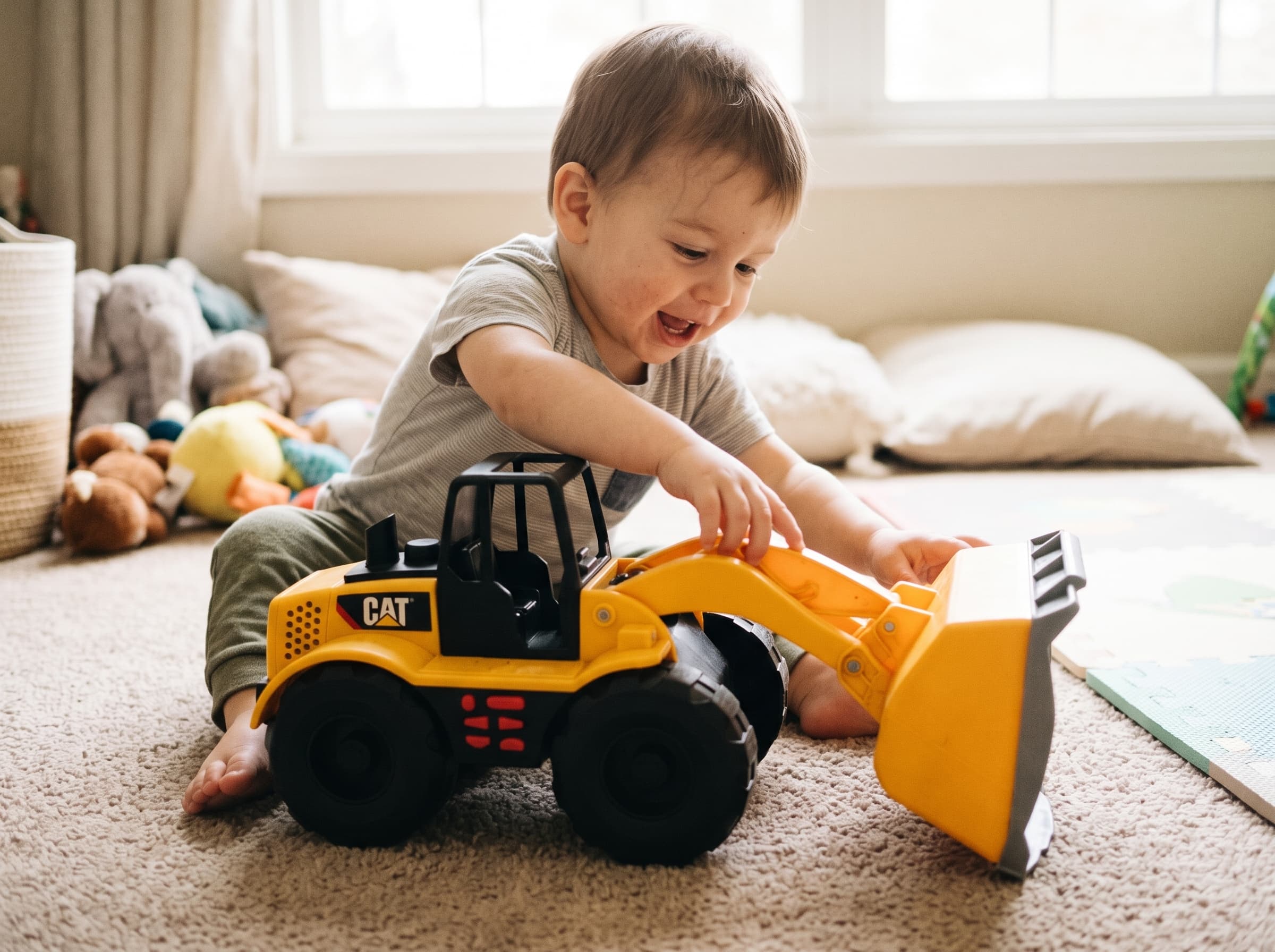 Pre-loved CAT Wheel Loader Toy with Lifting Bucket – Yellow